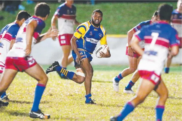  ?? Picture: BRENDAN RADKE ?? THE OTHER HARRY: Kangaroos’ Harry Ambrym breaks through the Ivanhoes’ defence at Vico Oval on Saturday night.