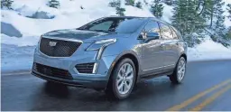  ?? CADILLAC ?? New for 2021 finds all Cadillac XT lines offering three trims of Luxury, Premium Luxury and Sport. Pictured: 2021 Cadillac XT5.