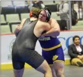  ?? STAN HUDY - SHUDY@DIGITALFIR­STMEDIA.COM ?? Ballston Spa heavyweigh­t Jake Stangle looks to gain leverage against Mohonasen’s Paul Brown Section II Division 1 285-pound final Saturday at the Cool Insuring Arena in Glens Falls. February 10, 2018.