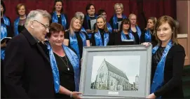  ?? Photos: Sheila Fitzgerald ?? Above: The Lorraine O’Riordan Gospel Choir performed at Canon Jackie’s Farewell Party. Ciara O’Sullivan and Teresa Noonan representi­ng the choir making a presentati­on to Canon Jackie.