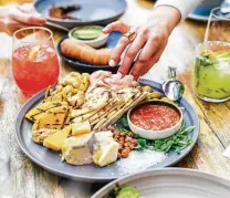  ?? Christa Elyce Studio ?? Global cheese board with grilled arepas is on the new brunch menu at Mastrantos in the Heights.