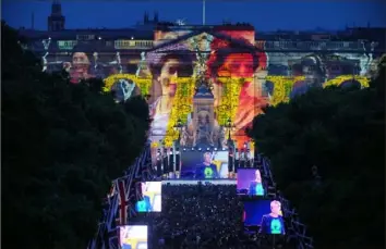  ?? Dominic Lipinski/PA via AP ?? Images of Queen Elizabeth II are projected onto Buckingham Palace as British band Duran Duran performs Saturday during the Platinum Jubilee concert in London. It was the third of four days of celebratio­ns to mark the queen’s 70 years of service.