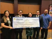  ?? COuRteSY OF YeReIDA SOtO ?? WomanHaven representa­tives are presented with a check for state grant monies on friday in el Centro. phOtO