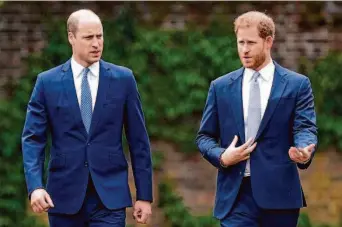  ?? Yui Muk/Associated Press 2021 ?? Prince William (left) and Prince Harry arrive for the unveiling of a statue on what would have been the 60th birthday of their mother, Princess Diana, on July 1, 2021, at Kensington Palace.