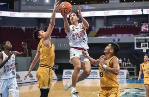  ?? ?? UAAP ACTION.
Ricci Rivero led the UP Fighting Maroons with 19 points. (UAAP Season 84 Media Team)*