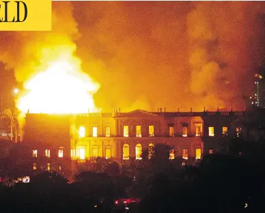  ?? STR/AFP/GETTY IMAGES ?? A massive fire engulfs Brazil’s 200-year-old National Museum in Rio de Janeiro on Sunday.