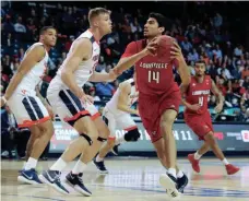  ?? BRAD PENNER/USA TODAY SPORTS ?? Louisville senior Anas Mahmoud said playing in the NIT was the best decision.