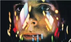  ??  ?? Keir Dullea portrays astronaut Dave Bowman in 2001: A Space Odyssey. Special effects included filming drops of paint in various liquids.