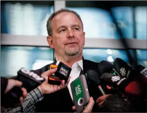  ?? CP PHOTOS JEFF MCINTOSH ?? Crown prosecutor Shane Parker speaks to reporters Thursday in Calgary following a guilty verdict for Douglas Garland, who was sentenced Friday to spend the rest of his life — and then some — in prison.