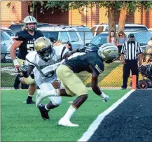  ?? TIM GODBEE / For the Calhoun Times ?? Calhoun’s Bralin Barton (4) runs across the goal line for a touchdown reception in the first quarter on Friday.