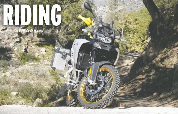  ?? DAVID BOOTH ?? The 40th anniversar­y edition of BMW's baby GS, the F 850 Adventure, is smaller and lighter than its big brother, the R 1250, but David Booth swears it's better.