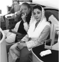  ?? PHOTO: REUTERS ?? Ousted Pakistani PM Nawaz Sharif and his daughter Maryam on a Lahore-bound flight at Abu Dhabi airport