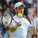  ?? ALASTAIR GRANT/AP ?? Two-time champ Andy Murray hits a forehand during his second-round loss to John Isner at Wimbledon on Wednesday.