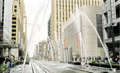  ?? Houston Chronicle file ?? After the fountains were officially opened in 2004, this water display decorated the light rail’s Main Street Square Station.