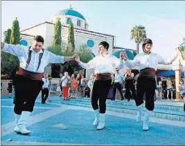  ?? Elizabeth Brumley ?? Las Vegas Review-journal Greek dancers perform Sunday at the 45th annual Greek Food Fest at St. John the Baptist Greek Orthodox Church in Las Vegas.