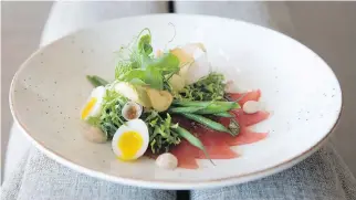  ??  ?? Hopkins’s tuna carpaccio niçoise is a perfect twist on a classic dish. The aioli made the difference.