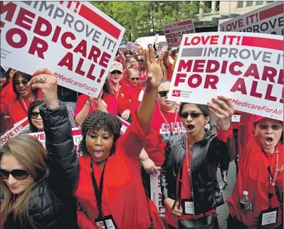  ?? Win McNamee Getty Images ?? THERE ARE several ways to fund “Medicare for all” without increasing the burden on the middle class or poor.