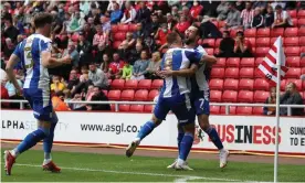  ?? Photograph: Paul Greenwood/Shuttersto­ck ?? The gloom has lifted at Wigan and been replaced by optimism with the club under new ownership.