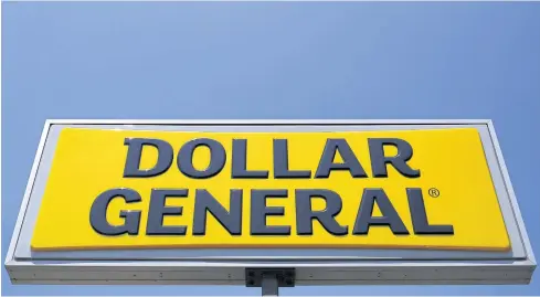  ?? REUTERS ?? A sign is seen outside a Dollar General store in Chicago, Illinois.