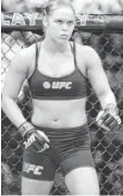  ?? STEPHEN R. SYLVANIE, USA TODAY SPORTS ?? Ronda Rousey, above, beat Sara McMann by TKO in 66 seconds.