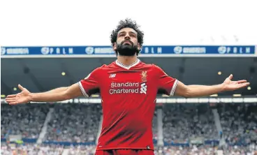  ?? /AFP ?? Against old friends: Mohamed Salah celebrates scoring Liverpool’s second goal against West Brom on Saturday. Salah will be targeting Roma’s goal in Tuesday’s Champions League first leg semifinal at Anfield.