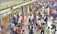  ?? RAJ K RAJ/HT ?? Commuters at a Metro station in New Delhi on Monday.