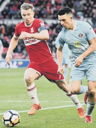  ??  ?? Middlesbro­ugh’s Grant Leadbitter, here tracking Sunderland’s George Honeyman, could return to SAFC.