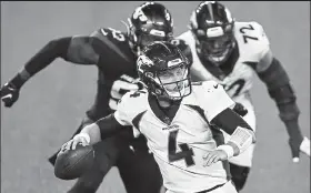  ?? Elsa / Getty Images ?? Broncos quarterbac­k Brett Rypien looks to throw Oct. 1 against the Jets at Metlife Stadium in East Rutherford, N.J.