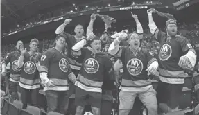  ?? BRAD PENNER/USA TODAY SPORTS ?? NFL Jets players cheered on the Islanders during home NHL playoff games.