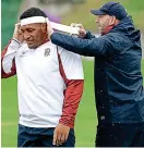  ??  ?? Got it taped: Mako Vunipola gets ready for training