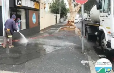  ??  ?? THE City has faced backlash after the Sea Point Central Improvemen­t District posted a picture of the suburb’s pavements and streets being disinfecte­d.