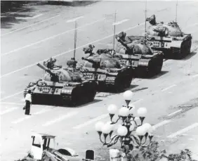  ?? JEFF WIDENER/AP ?? “Tank man” faces off troops on June 5, 1989.