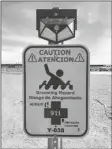  ?? PHOTO BY YUMA SECTOR BORDER PATROL ?? THE YUMA SECTOR BORDER PATROL recently installed new signs along the banks of the Salinity Canal warning migrants about the dangers of attempting to swim across it.