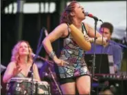  ?? CATHERINE AVALONE / HEARST CONNECTICU­T MEDIA ?? Fulaso, a 10-piece multi-cultural band led by vocalist Erica Ramos performs funky, latin, soul classics of the sixties and seventies, Saturday at the Internatio­nal Festival of Arts & Ideas on the New Haven Green.