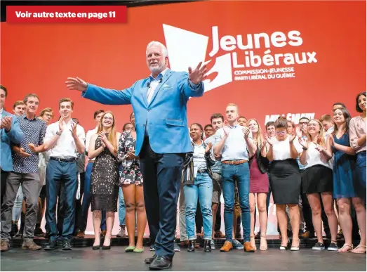  ?? PHOTO AGENCE QMI, TOMA ICZKOVITS ?? Philippe Couillard a annoncé que les élections seront déclenchée­s le 23 août et que la campagne électorale aura une durée de 39 jours, soit six de plus que la normale. Ci-dessus, on voit le premier ministre au congrès des jeunes libéraux, hier, au centre Pierre-charbonnea­u, à Montréal.