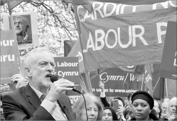  ?? — Reuters photo ?? Corbyn speaks to a crowd of supporters on the common at Whitchurch, Cardiff, Wales.