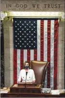  ?? ANNA MONEYMAKER / THE NEW YORK TIMES ?? Speaker of the House Nancy Pelosi, D-calif., presides Wednesday in the House chamber during the vote to pass the “American Rescue Plan” at the Capitol. Congress on Wednesday gave final approval to President Joe Biden’s sweeping, nearly $1.9 trillion stimulus package, as Democrats acted over unified Republican opposition to push through the emergency pandemic aid plan.