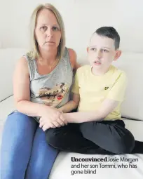  ??  ?? Unconvince­d Josie Morgan and her son Tommi, who has gone blind