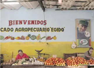  ?? F R A N K L I N R E Y E S / T H E A S S O C I AT E D P R E S S ?? The ethos of capitalism is increasing­ly seeping into Cuban life, often in stark conflict with fundamenta­l tenets of the Cuban Revolution. American tourism is eagerly anticipate­d.