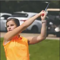  ?? The Sentinel-Record/Richard Rasmussen ?? TEEING UP: Lake Hamilton freshman Ginny Higginboth­am hits off the practice tee prior to the Class 5A girls state tournament practice round Tuesday at Hot Springs Country Club. The tournament is set to tee off at 11 a.m. today.