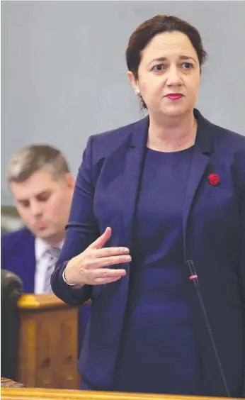  ?? Picture: LIAM KIDSTON ?? Premier Annastacia Palaszczuk speaks to Parliament during Question Time yesterday, when embattled Police Minister Mark Ryan (back) again came under fire.