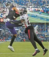  ?? BALTIMORE SUN
KENNETH K. LAM/ ?? Ravens wide receiver Demarcus Robinson, left, catches a touchdown pass from Tyler Huntley against Falcons cornerback Cornell Armstrong in the second quarter Saturday at M&T Bank Stadium.