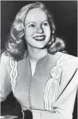  ?? THE ASSOCIATED PRESS FILE ?? Peggy Cummins, 20, smiles in Superior Court, on Dec. 26, 1945 in Los Angeles, after her contract with Twentieth Century- Fox Studio had been approved. Cummins, who retired from acting in the early 1960s, died Friday, in London at age 92.