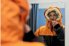  ?? ALDEN WILLIAMS/FAIRFAX NZ ?? Journalist and adventurer Ashlan Cousteau prepares for the cold at the Antarctica New Zealand centre on Monday.