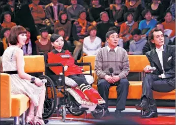  ?? PHOTOS BY SUN RUISHENG / CHINA DAILY ?? Zhang Junli (second from right) appears on a program on Channel 3 of China Central Television in Beijing, in 2014.