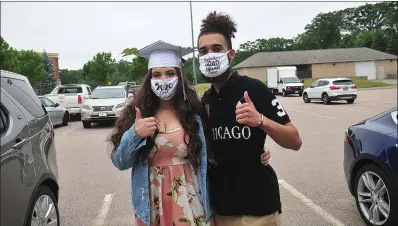  ?? Photos by Ernest A. Brown ?? Isabella Picerno, a member of Lincoln High School’s Class of 2020, left, poses with her boyfriend, Jayden Albizu, of Lincoln, after receiving her diploma during a makeshift ceremony at the Lincoln Middle School last week.