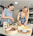  ??  ?? Say cheese: Hero helps Helen create an Instagram-worthy cheeseboar­d, below