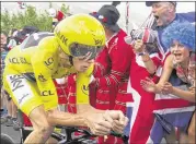  ?? PETER DEJONG / AP ?? Chris Froome acknowledg­ed after Thursday’s time-trial victory the Tour de France was his to lose. “The main thing for me now is staying safe,” he said.