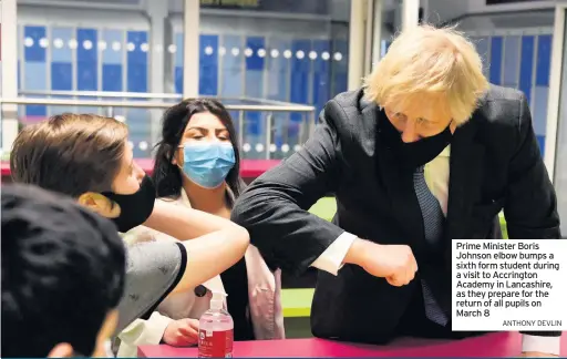  ?? ANTHONY DEVLIN ?? Prime Minister Boris Johnson elbow bumps a sixth form student during a visit to Accrington Academy in Lancashire, as they prepare for the return of all pupils on March 8