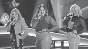  ?? CASEY DURKIN/NBC ?? The Oklahoma pop trio OK3 performs on the premiere blind auditions episode of “The Voice” Season 25.